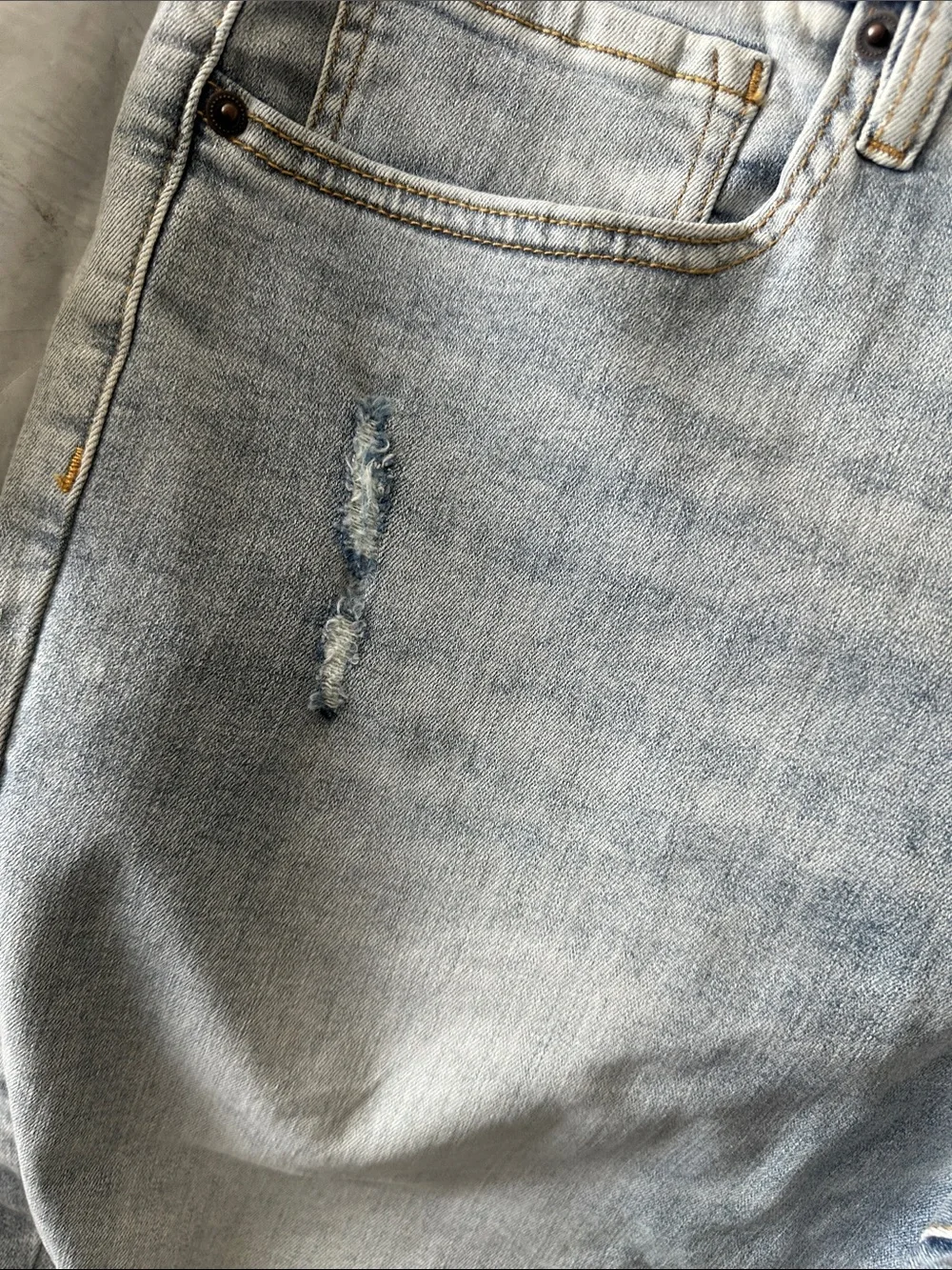 LAZER Men’s Light Blue Skinny Jeans with Distressed Details